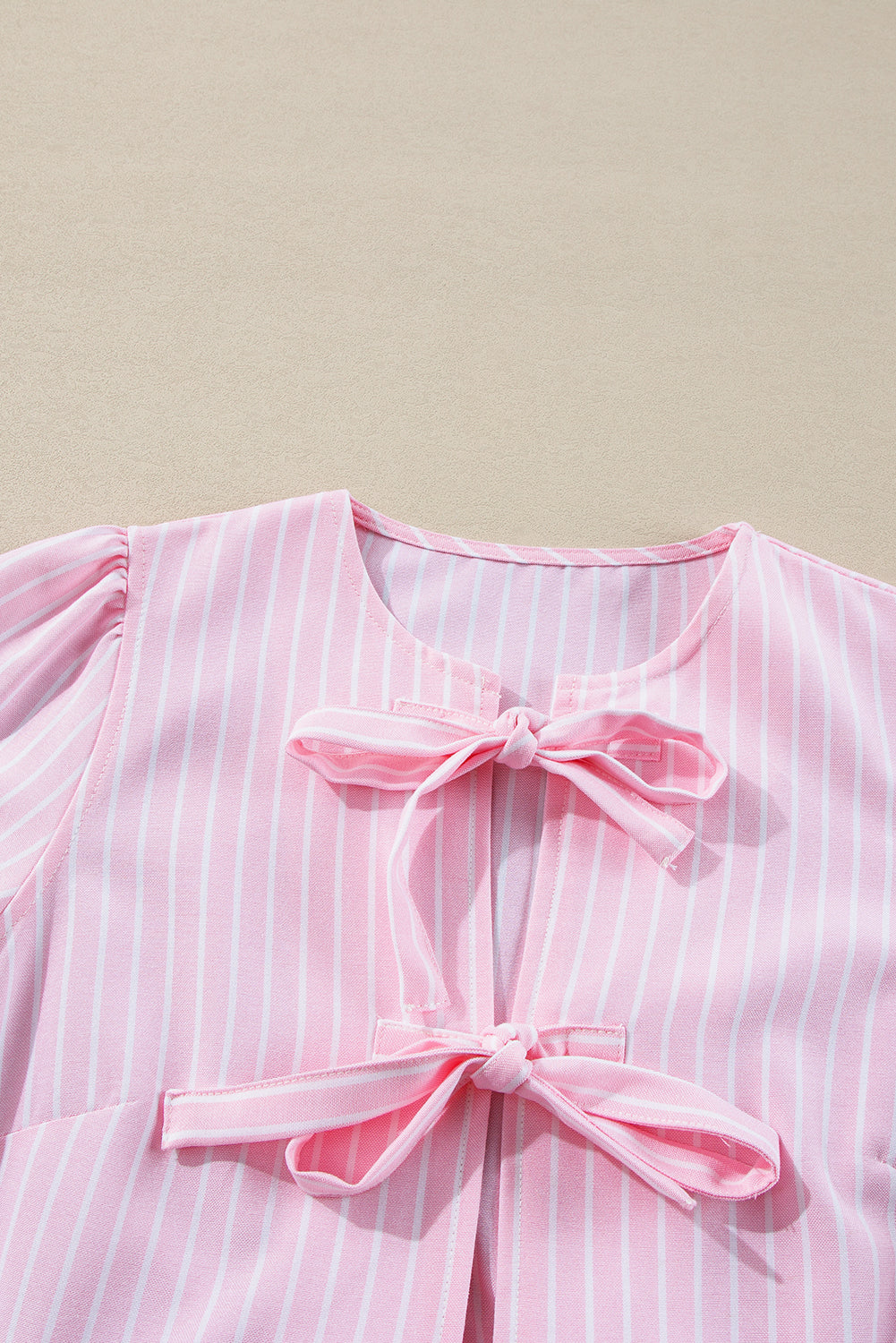 Tied Bow Striped Round Neck Blouse.