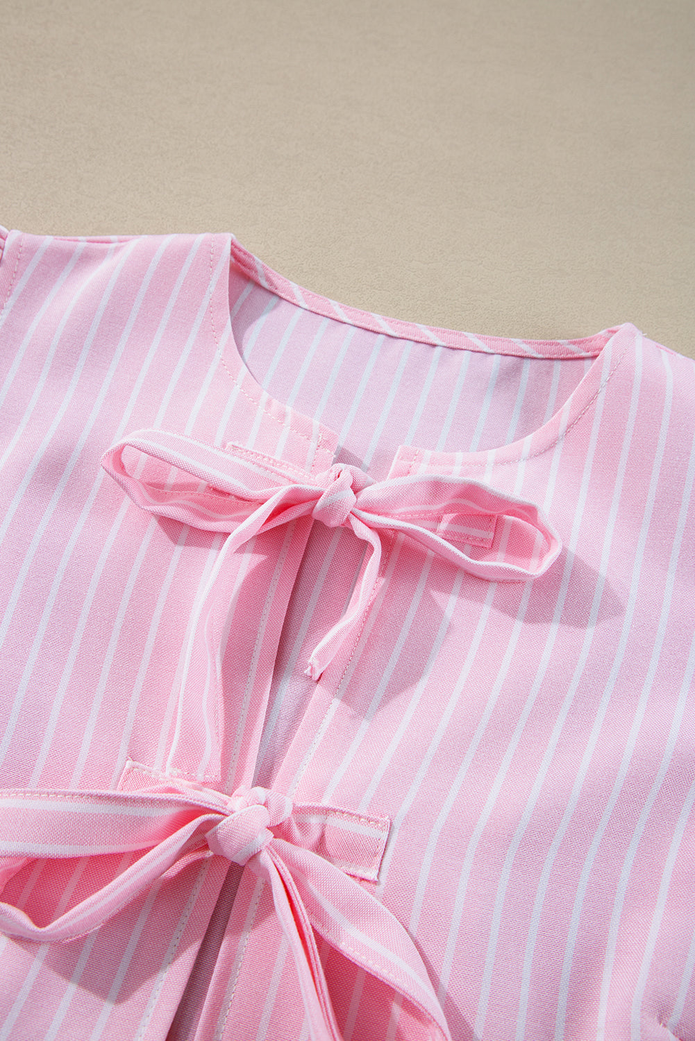 Tied Bow Striped Round Neck Blouse.