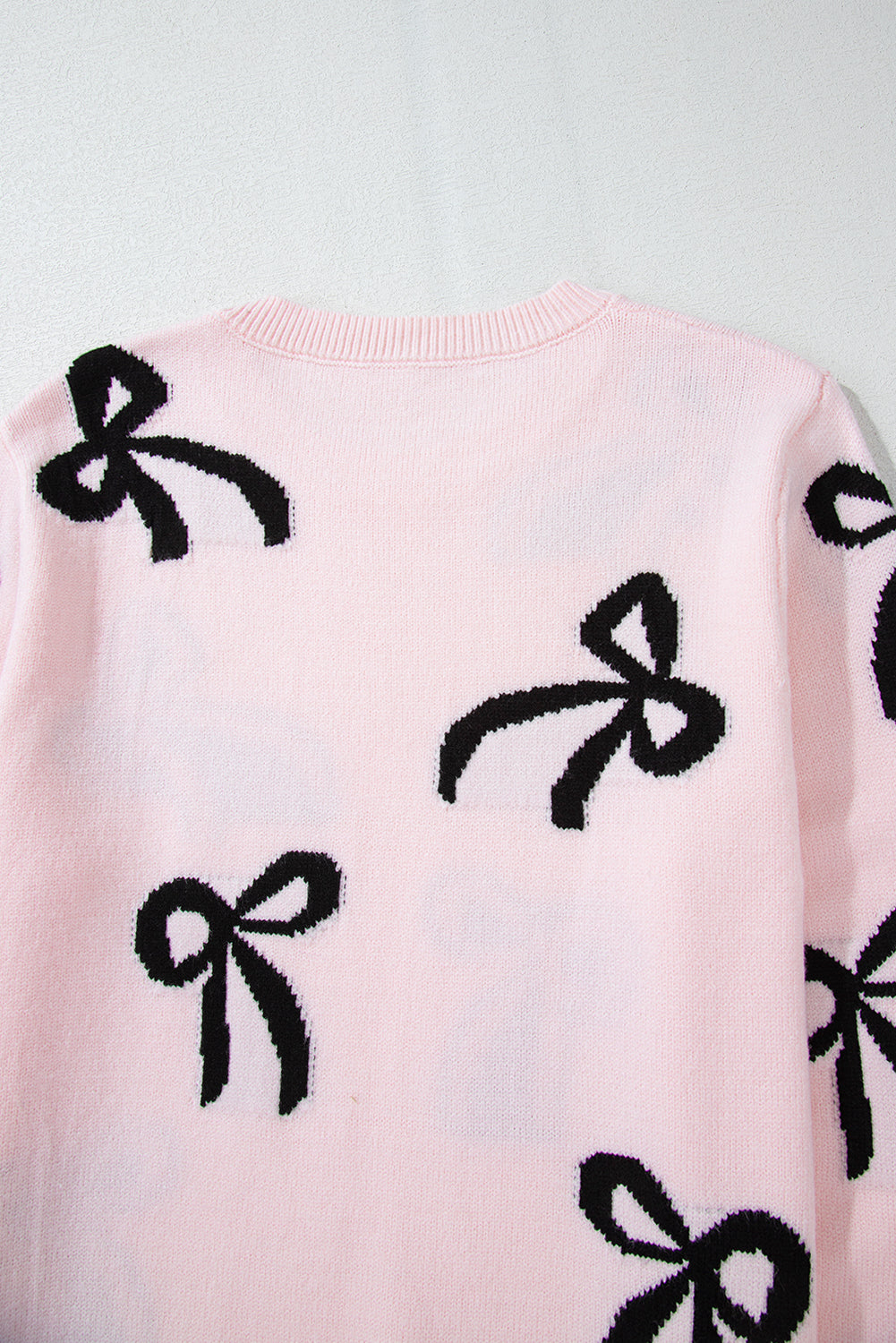 Bow Pattern Round Neck Fit Sweater